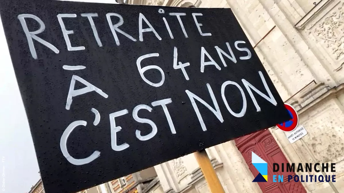 Pancarte noire avec l'inscription "Retraite à 64 ans c'est non"